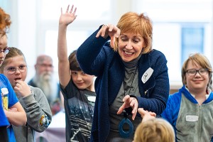Gail Sidonie Šobat playing with kids
