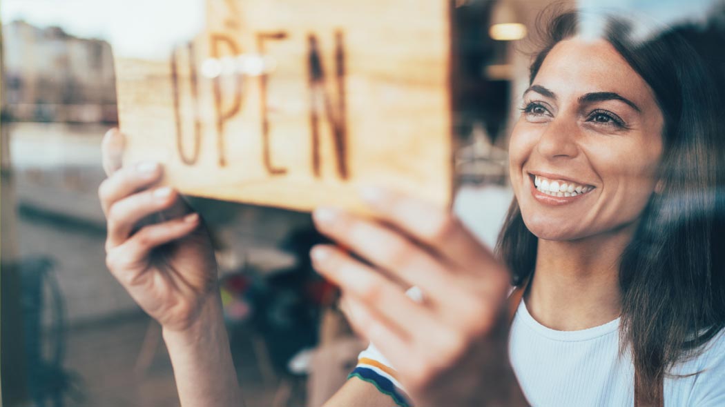  Business owner opening her store.