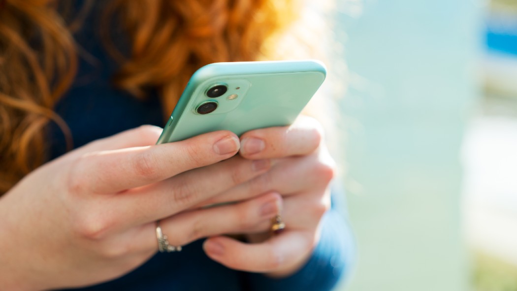 Woman holding a phone