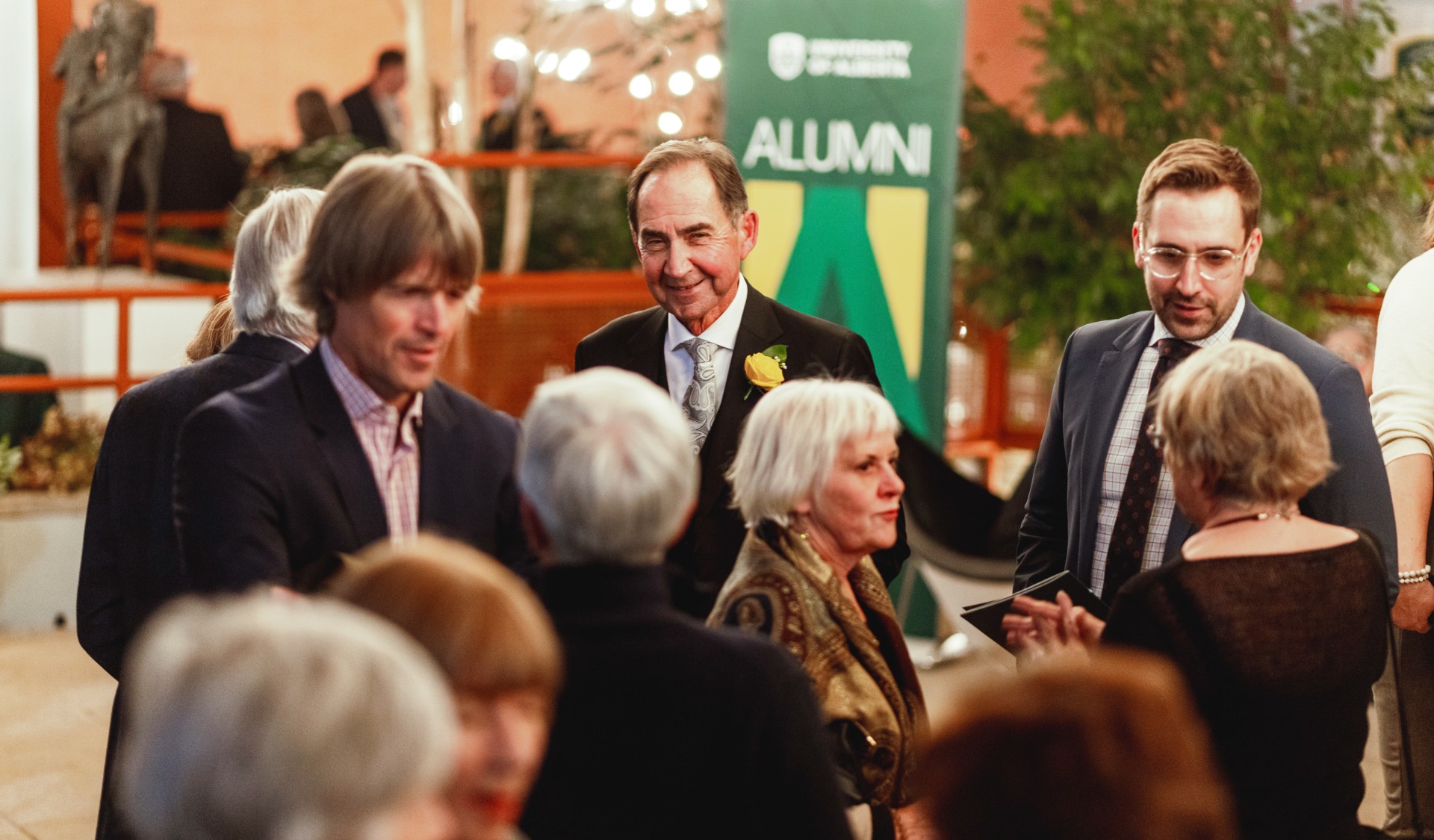 Group of people at an alumni event