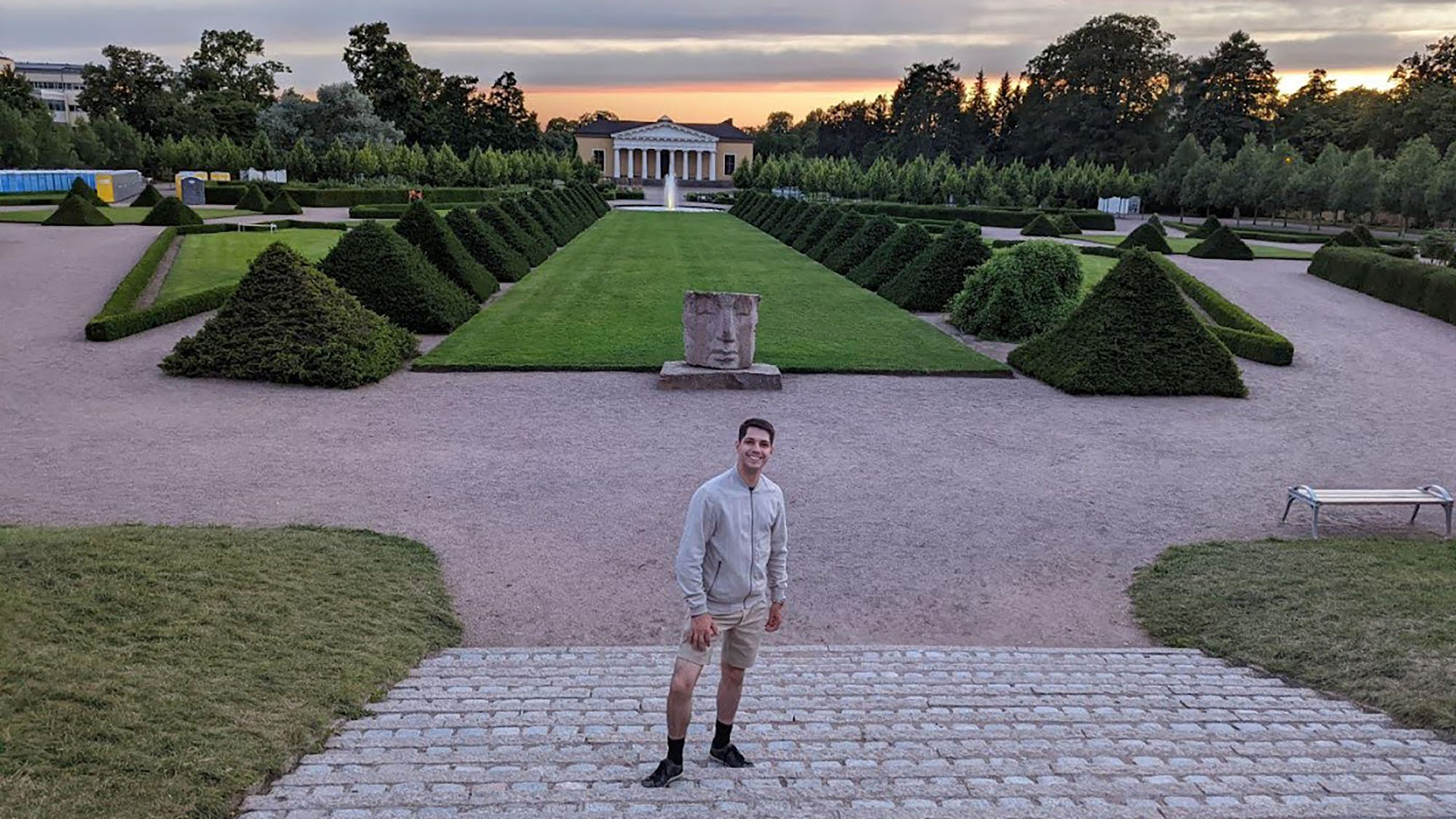 Marcus Bustamante standing in a garden