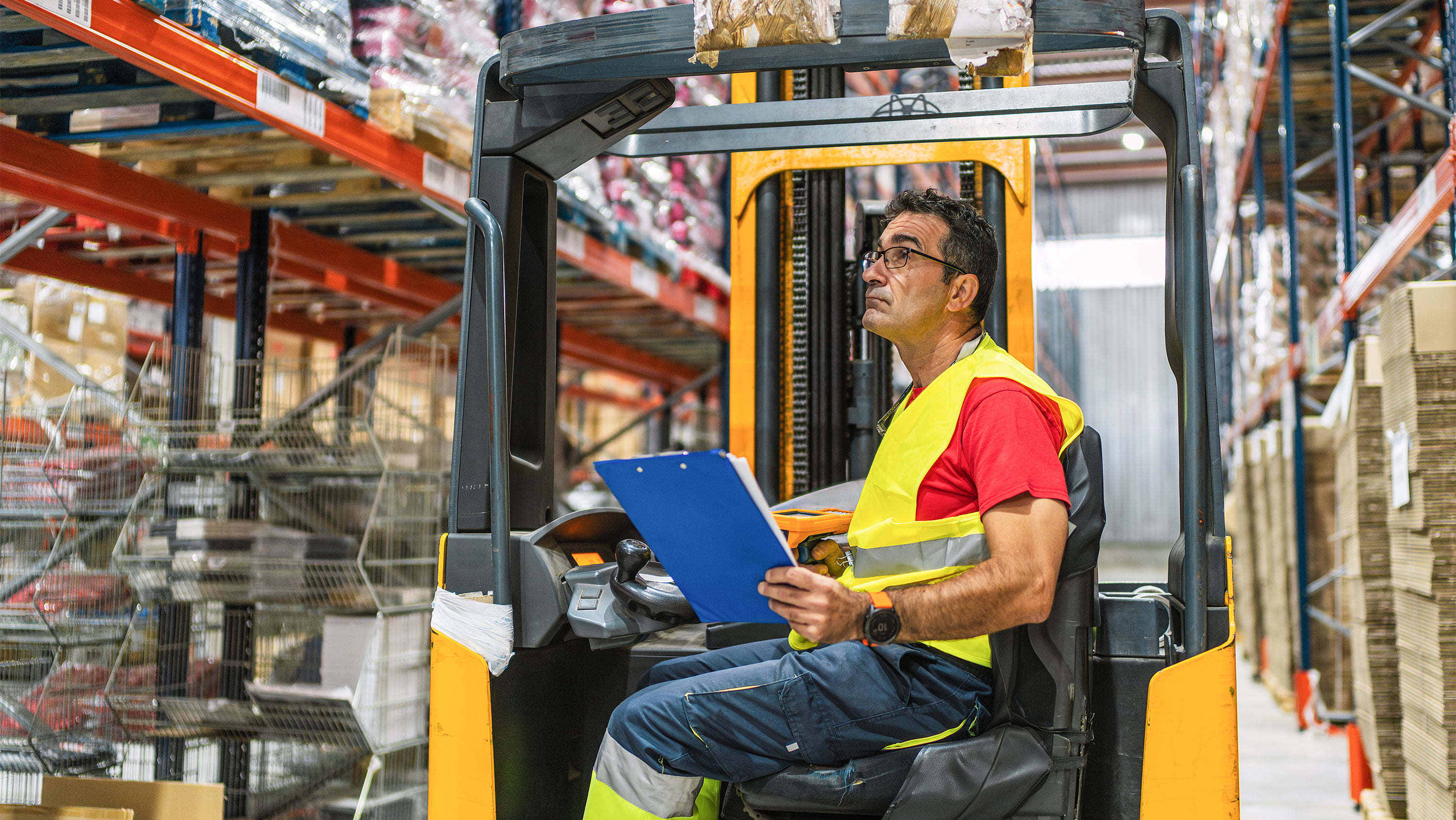 Warehouse worker drives forklift. (Photo: Getty Images)