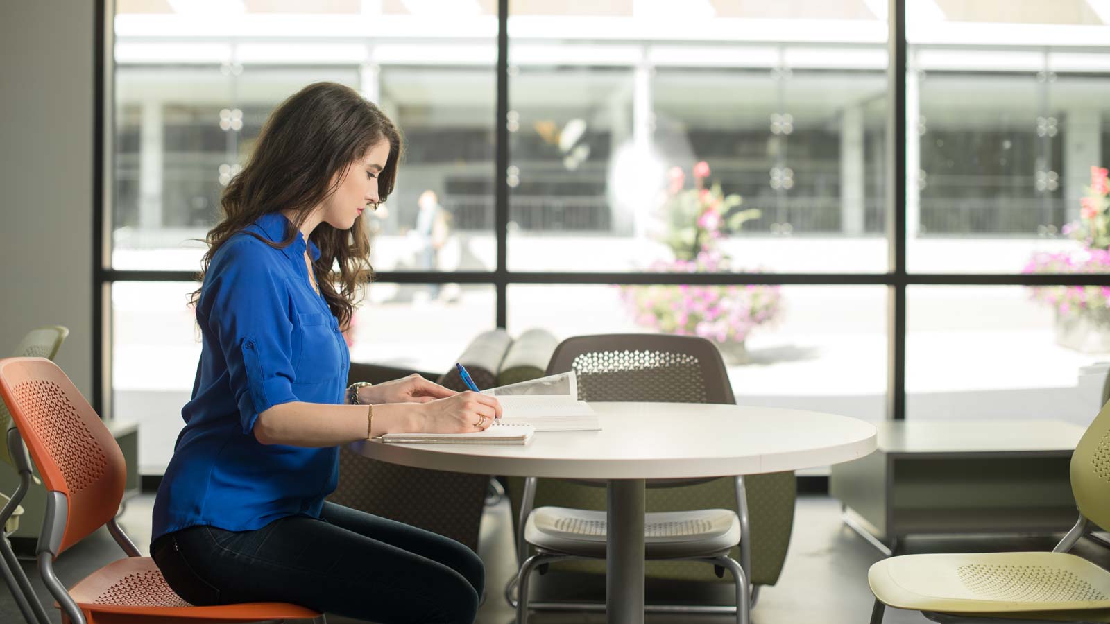 Student studying at a table