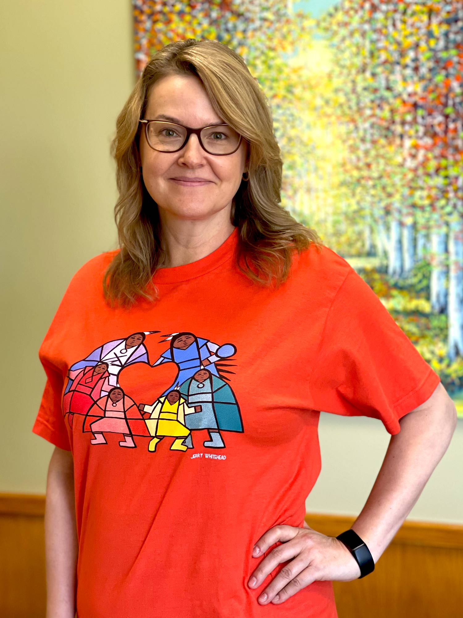 Tammy Hopper wearing an orange shirt