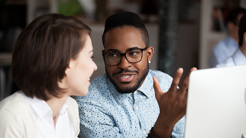 man talking to a woman