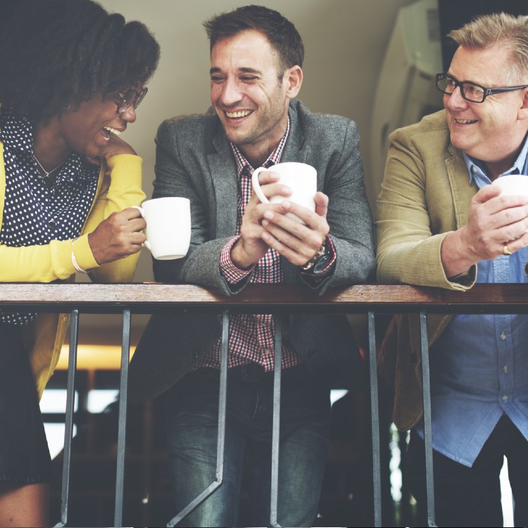 three people having coffee