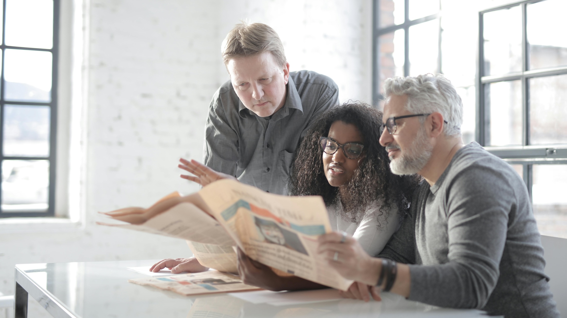 A group of people having discussion on a news article