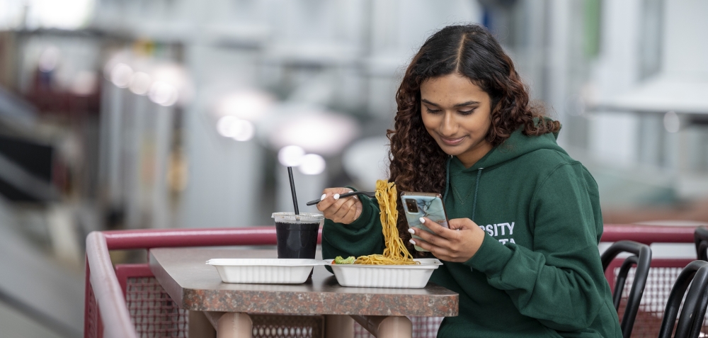 Girl eating noodles