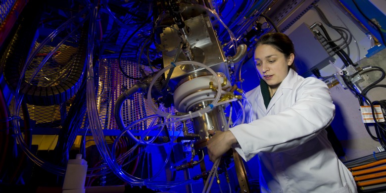 Dr. Katie Gagnon works on the new cyclotron.