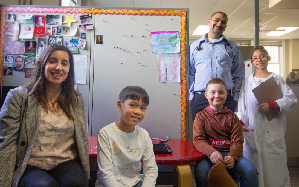 U of A researchers Sukhpreet Tamana (left) and Piush Mandhane with youngsters in the CHILD Cohort Study.