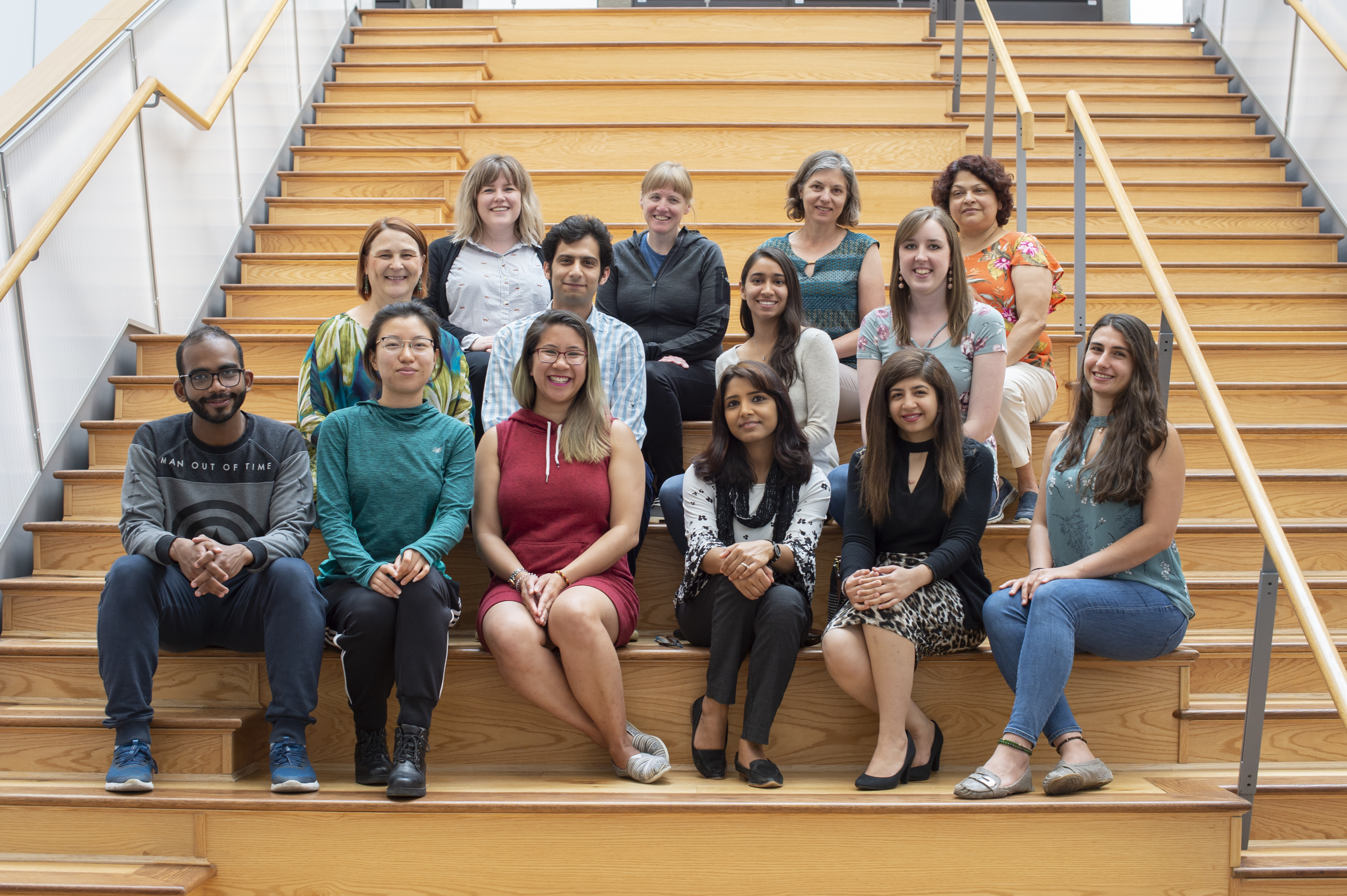 MatCH program staff and students sitting on stairs