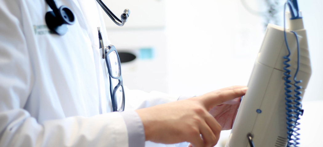 Medical student working on a machine