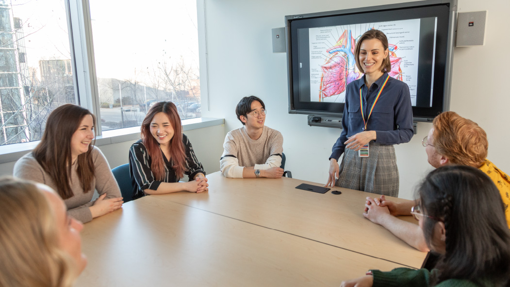 Medical students chatting in a meeting space